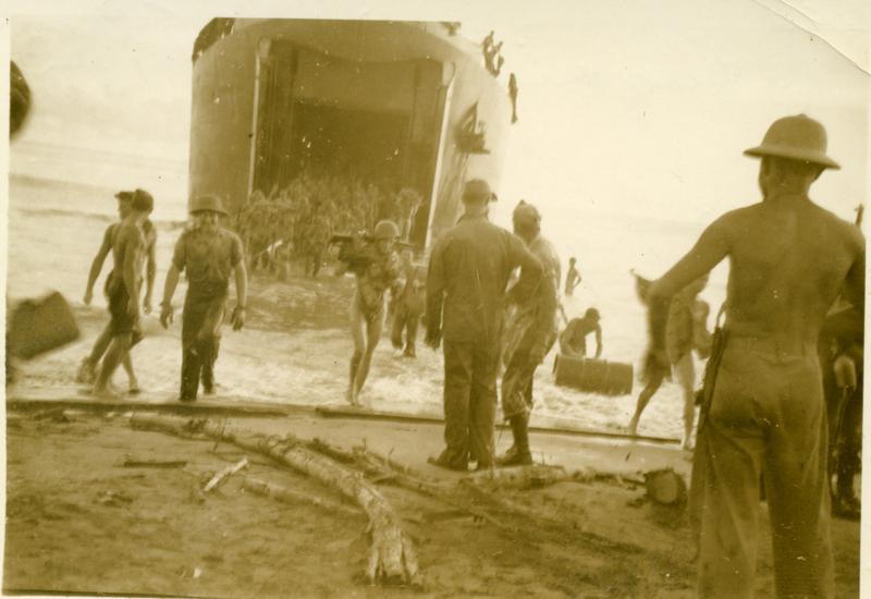 Bougainville, Dec. 25,1943. Army coming ashore Christmas morning